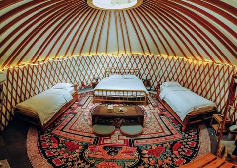 Yurt 6 | Premium bedding, memory foam beds, in-room safe, individually decorated