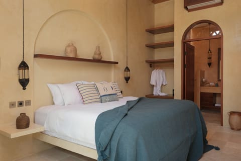 Two Bedroom Lagoon Pool Villa | Minibar, in-room safe, individually furnished, desk