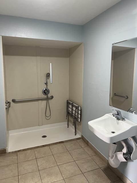 Queen Room - Disability Access | Bathroom | Shower, hair dryer, towels, soap