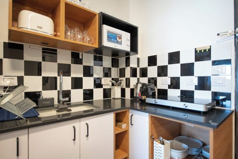 Apartment, 2 Bedrooms, Balcony | Private kitchen | Fridge, microwave, stovetop, espresso maker