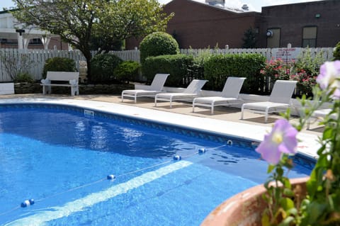 Outdoor pool, open 10:00 AM to 10:00 PM, pool umbrellas, sun loungers
