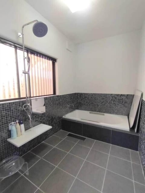 Comfort House, 3 Bedrooms, Non Smoking, Ocean View (Half-board or optional packages available) | Bathroom | Combined shower/tub, deep soaking tub, rainfall showerhead