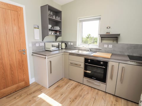 Fridge, electric kettle, toaster, cookware/dishes/utensils