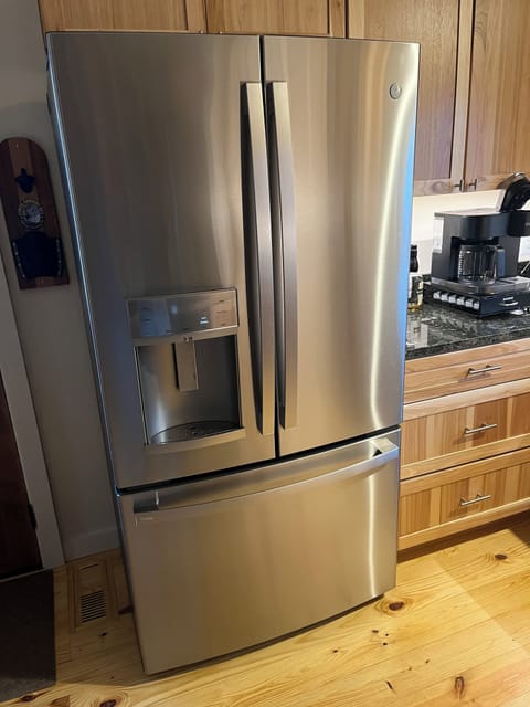 High end refrigerator with ice machine and filtered water.