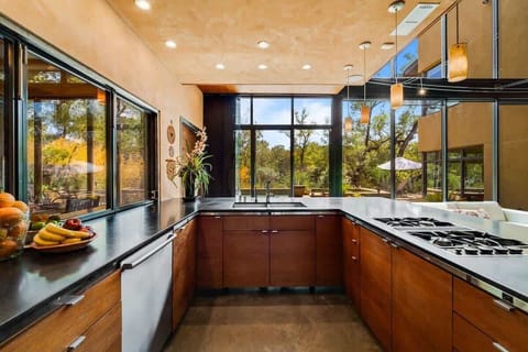 Wide kitchen area for those delicious home cooked meal? Here it is.