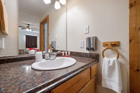 Room, 2 Double Beds | Bathroom | Shower, free toiletries, hair dryer, towels