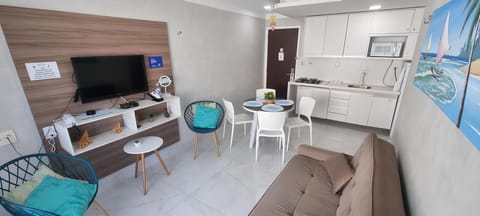 Deluxe Apartment, 1 King Bed with Sofa bed, Kitchen, Beachfront | Living area | 32-inch flat-screen TV with cable channels, Netflix, smart speakers