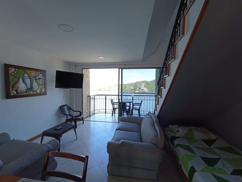 Family Apartment, 2 Bedrooms, Sea View | Living area | Flat-screen TV