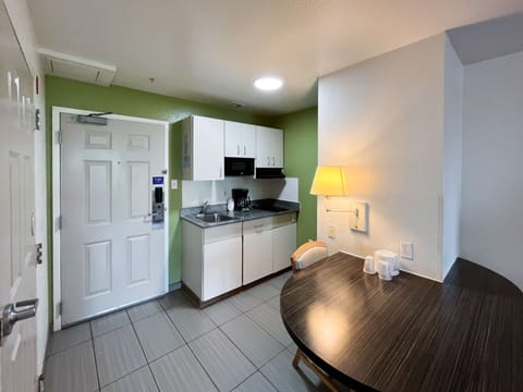 Standard Room, 2 Queen Beds, Non Smoking, Kitchenette | Private kitchenette | Full-size fridge, microwave, stovetop, cookware/dishes/utensils