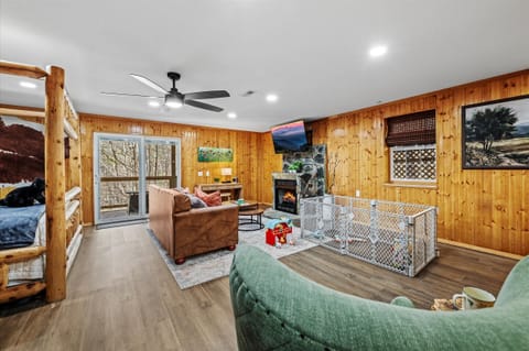 Cozy fireplace invites the family to relax and share cozy moments together.