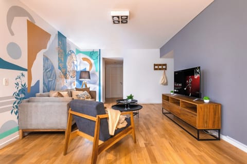 Family Apartment | Living area | 55-inch Smart TV with cable channels, Netflix, streaming services