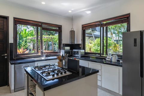 Electric kettle, highchair, cleaning supplies, paper towels