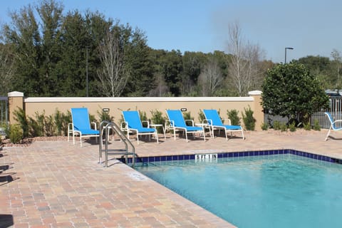 Outdoor pool, open 7:00 AM to 8:00 PM, sun loungers