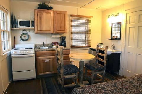 Cabin, 1 Bedroom | Private kitchen | Fridge, oven, coffee/tea maker, toaster