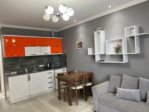 Premium Apartment | Private kitchen | Espresso maker, dining tables