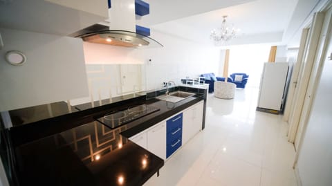 Apartment | Private kitchen | Full-size fridge, stovetop
