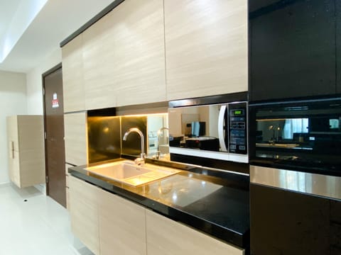 Full-size fridge, microwave, stovetop, rice cooker