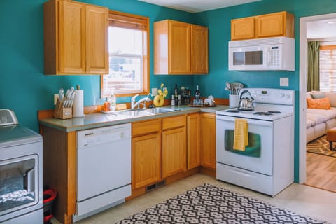 Large thoughtfully stocked kitchen 