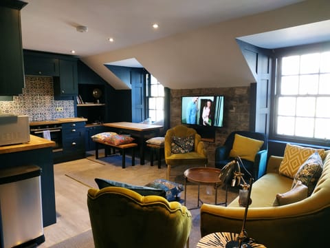 Living, dining and kitchen area