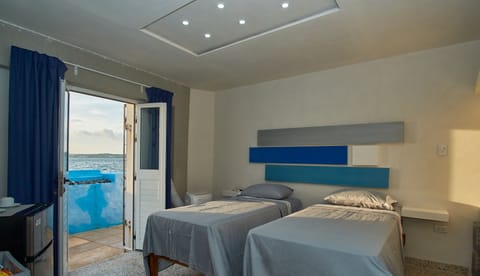 Comfort Room | Premium bedding, down comforters, minibar, in-room safe