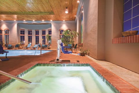 Indoor pool, open 7:00 AM to 10:00 PM, sun loungers