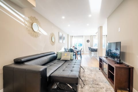 Grand Townhome, 3 Bedrooms, Terrace | Living area | 42-inch flat-screen TV with cable channels, Netflix, Hulu