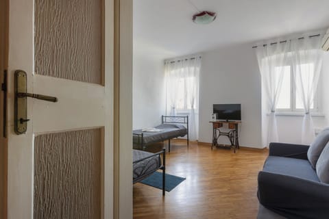 Panoramic Apartment | Living room | 30-inch Smart TV with digital channels, Netflix, streaming services