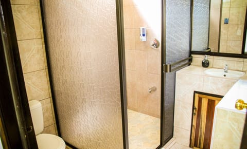 Superior Quadruple Room, 2 Double Beds | Bathroom | Shower, hair dryer, towels