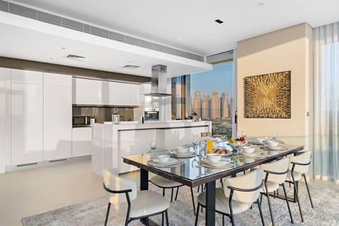 Dining Room: Sleek elegance meets stunning skyline views—perfect for memorable meals!