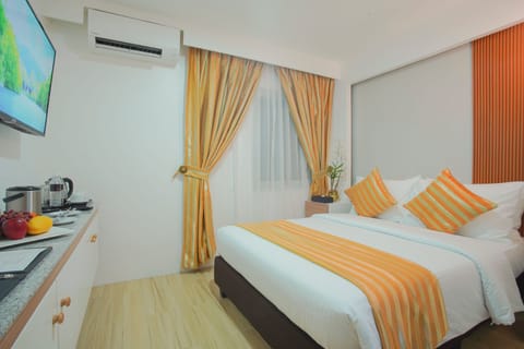 Deluxe Room | Desk, blackout drapes, iron/ironing board, free WiFi