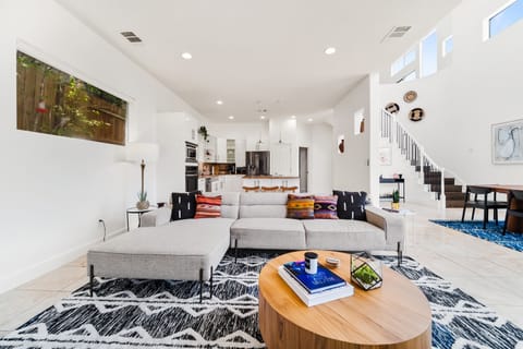 Step into pure comfort and spaciousness in this inviting living area.