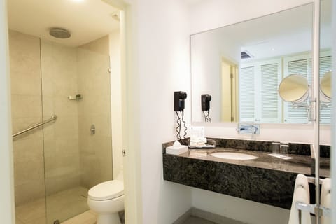 Double Room, Oceanfront | Bathroom | Shower, rainfall showerhead, free toiletries, hair dryer