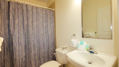 Family Condo | Bathroom | Combined shower/tub, hair dryer, towels, soap