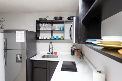 Comfort Studio | Private kitchen | Full-size fridge, microwave, stovetop, dishwasher