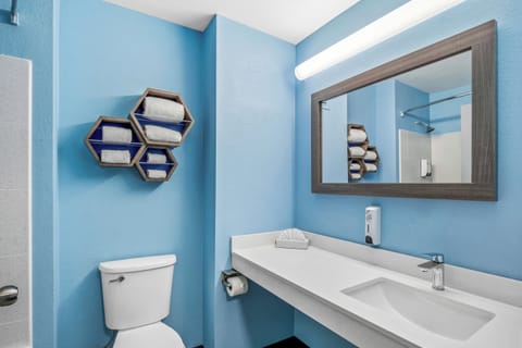 Suite, 2 Queen Beds, Non Smoking | Bathroom | Combined shower/tub, free toiletries, hair dryer, towels