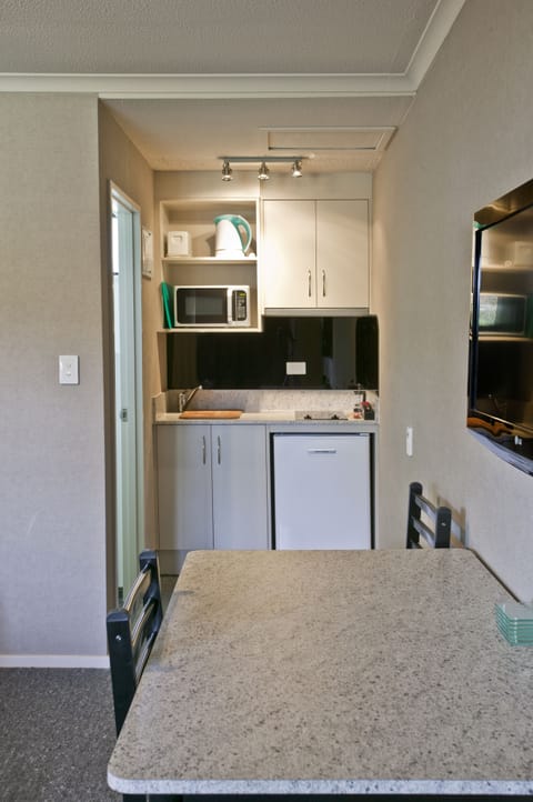 Self Contained Motel Unit | Private kitchen | Fridge, microwave, toaster