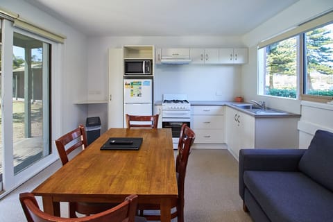 One Bedroom Cedar Cottage | Private kitchen | Fridge, microwave, oven, stovetop