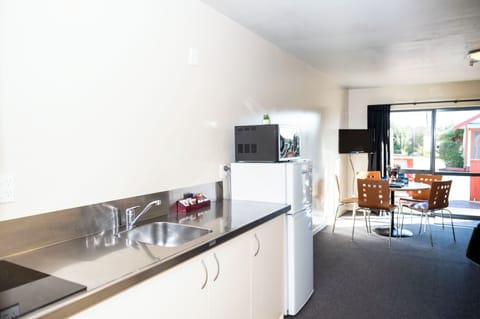 One Bedroom Motel | Private kitchen | Fridge, microwave, highchair