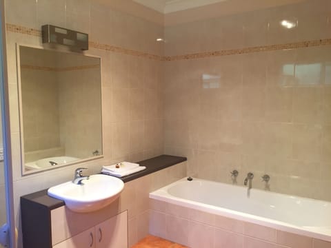 Separate tub and shower, free toiletries, towels