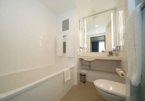 Separate tub and shower, eco-friendly toiletries, hair dryer, towels