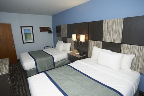 Deluxe Suite, Multiple Beds | Desk, blackout drapes, iron/ironing board, free WiFi