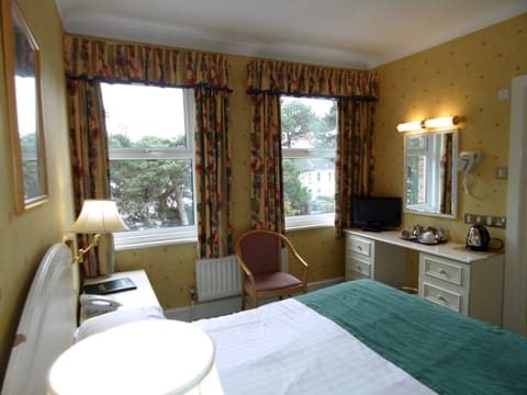 Standard Double Room | Desk, iron/ironing board, bed sheets, alarm clocks