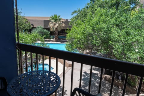 Premium Room, 1 King Bed, Balcony, Pool View | Terrace/patio