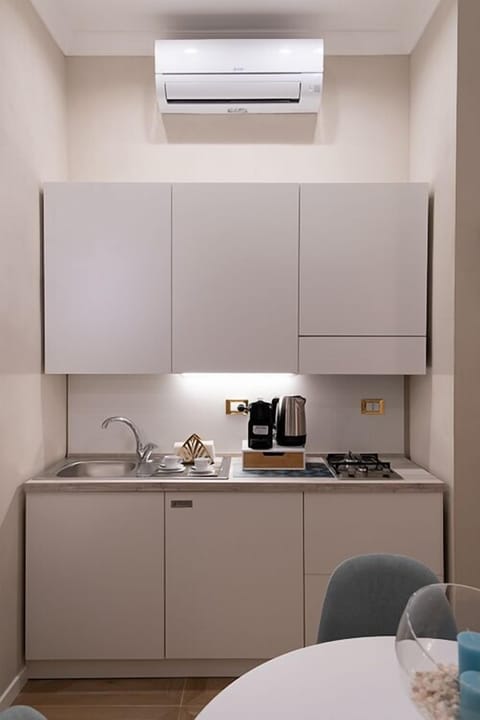 Deluxe Condo | Private kitchen | Mini-fridge, espresso maker, coffee/tea maker, electric kettle