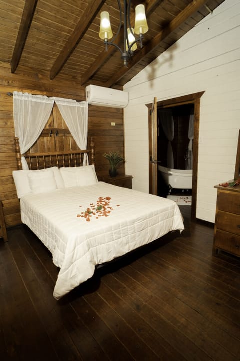 Honeymoon Cottage, 2 Bedrooms | Premium bedding, down comforters, iron/ironing board, free WiFi