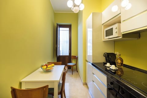 Deluxe Apartment (Minerva) | Private kitchen | Full-size fridge, microwave, stovetop, espresso maker