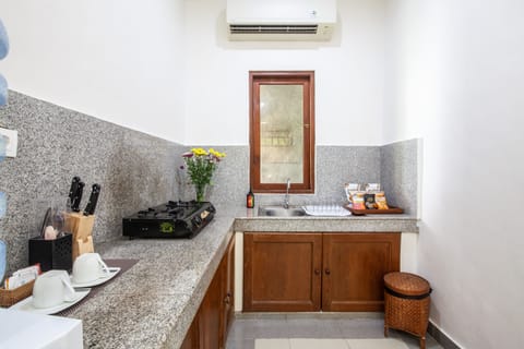 Villa | Private kitchen | Shared fridge, microwave, coffee/tea maker, electric kettle