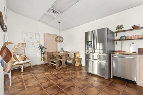 Combine dining and kitchen comfort in one welcoming space.