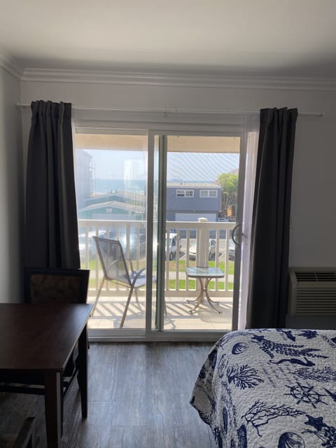 Deluxe Room, 2 Queen Beds, Ocean View | Desk, blackout drapes, iron/ironing board, free WiFi