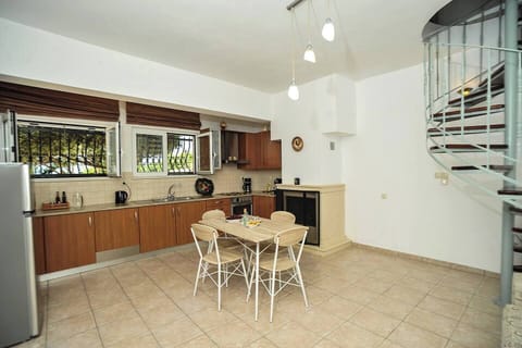 Bright and spacious kitchen to enjoy your meals or spend time together.